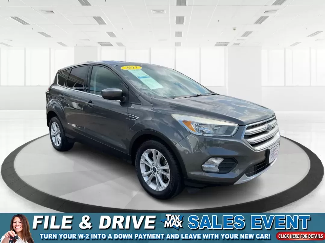 2017 Ford Escape SE (1FMCU0GD7HU) with an 1.5L L4 DOHC 16V engine, 6A transmission, located at 1099 N County Rd 25A , Troy, OH, 45373, (937) 908-9800, 40.057079, -84.212883 - **Experience Life on the Move with the 2017 Ford Escape SE at Advantage Car and Credit - Troy!**<br /> <br /> Are you ready to elevate your lifestyle with a versatile SUV that's perfect for family outings and weekend adventures? Look no further than the 2017 Ford Escape SE, available at Advantage Ca - Photo#0