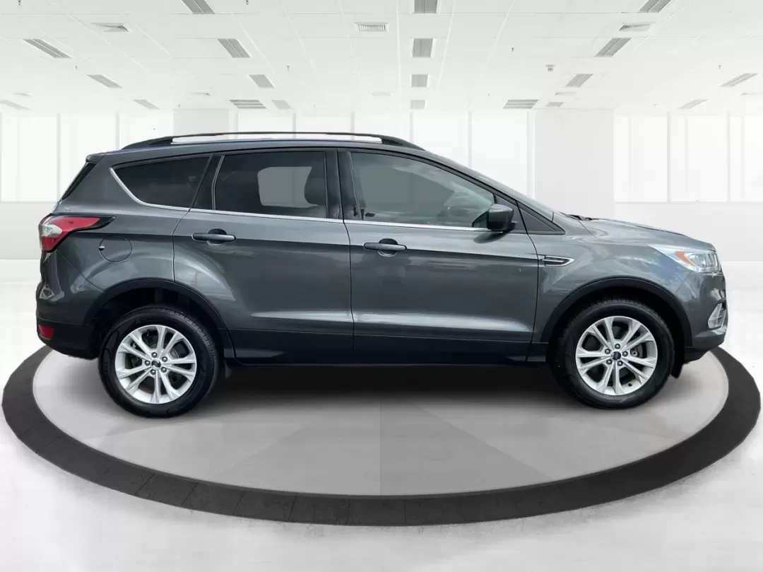 2017 Ford Escape SE (1FMCU9GD7HU) with an Other engine, located at 4508 South Dixie Dr, Moraine, OH, 45439, (937) 908-9800, 39.689976, -84.218452 - **Adventure Awaits With This 2017 Ford Escape SE! Perfect for Your Next Journey!**<br /> <br /> Are you ready to elevate your weekend getaways or daily commutes? The 2017 Ford Escape SE is the ideal SUV for those who crave versatility without sacrificing style. With a spacious interior, advanced saf - Photo#1