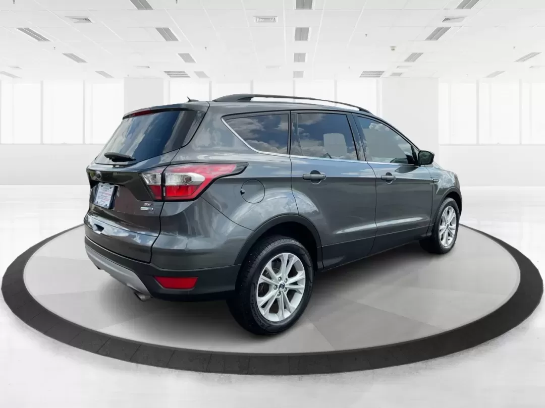 2017 Ford Escape SE (1FMCU9GD7HU) with an Other engine, located at 4508 South Dixie Dr, Moraine, OH, 45439, (937) 908-9800, 39.689976, -84.218452 - **Adventure Awaits With This 2017 Ford Escape SE! Perfect for Your Next Journey!**<br /> <br /> Are you ready to elevate your weekend getaways or daily commutes? The 2017 Ford Escape SE is the ideal SUV for those who crave versatility without sacrificing style. With a spacious interior, advanced saf - Photo#2