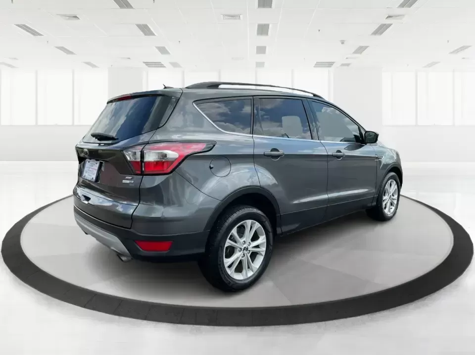 2017 Ford Escape SE (1FMCU9GD7HU) with an 1.5L L4 DOHC 16V engine, 6A transmission, located at 4508 South Dixie Dr, Moraine, OH, 45439, (937) 908-9800, 39.689976, -84.218452 - **Adventure Awaits With This 2017 Ford Escape SE! Perfect for Your Next Journey!**<br /> <br /> Are you ready to elevate your weekend getaways or daily commutes? The 2017 Ford Escape SE is the ideal SUV for those who crave versatility without sacrificing style. With a spacious interior, advanced saf - Photo#2