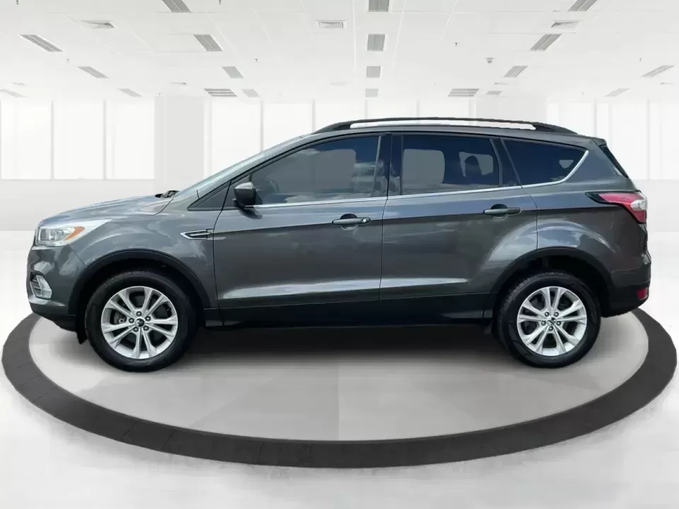 2017 Ford Escape SE (1FMCU9GD7HU) with an 1.5L L4 DOHC 16V engine, 6A transmission, located at 4508 South Dixie Dr, Moraine, OH, 45439, (937) 908-9800, 39.689976, -84.218452 - **Adventure Awaits With This 2017 Ford Escape SE! Perfect for Your Next Journey!**<br /> <br /> Are you ready to elevate your weekend getaways or daily commutes? The 2017 Ford Escape SE is the ideal SUV for those who crave versatility without sacrificing style. With a spacious interior, advanced saf - Photo#5