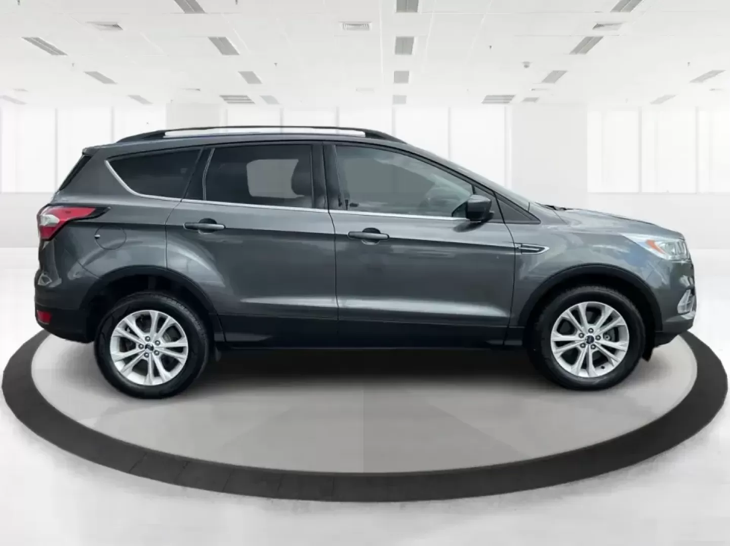 2017 Ford Escape SE (1FMCU9GD7HU) with an 1.5L L4 DOHC 16V engine, 6A transmission, located at 8750 N County Rd 25A, Piqua, OH, 45356, (937) 908-9800, 40.164391, -84.232513 - **Adventure Awaits With This 2017 Ford Escape SE! Perfect for Your Next Journey!**<br /> <br /> Are you ready to elevate your weekend getaways or daily commutes? The 2017 Ford Escape SE is the ideal SUV for those who crave versatility without sacrificing style. With a spacious interior, advanced saf - Photo#1