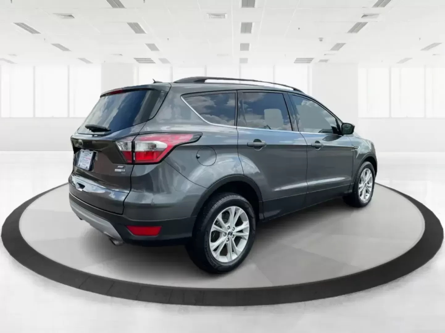 2017 Ford Escape SE (1FMCU9GD7HU) with an 1.5L L4 DOHC 16V engine, 6A transmission, located at 8750 N County Rd 25A, Piqua, OH, 45356, (937) 908-9800, 40.164391, -84.232513 - **Adventure Awaits With This 2017 Ford Escape SE! Perfect for Your Next Journey!**<br /> <br /> Are you ready to elevate your weekend getaways or daily commutes? The 2017 Ford Escape SE is the ideal SUV for those who crave versatility without sacrificing style. With a spacious interior, advanced saf - Photo#2