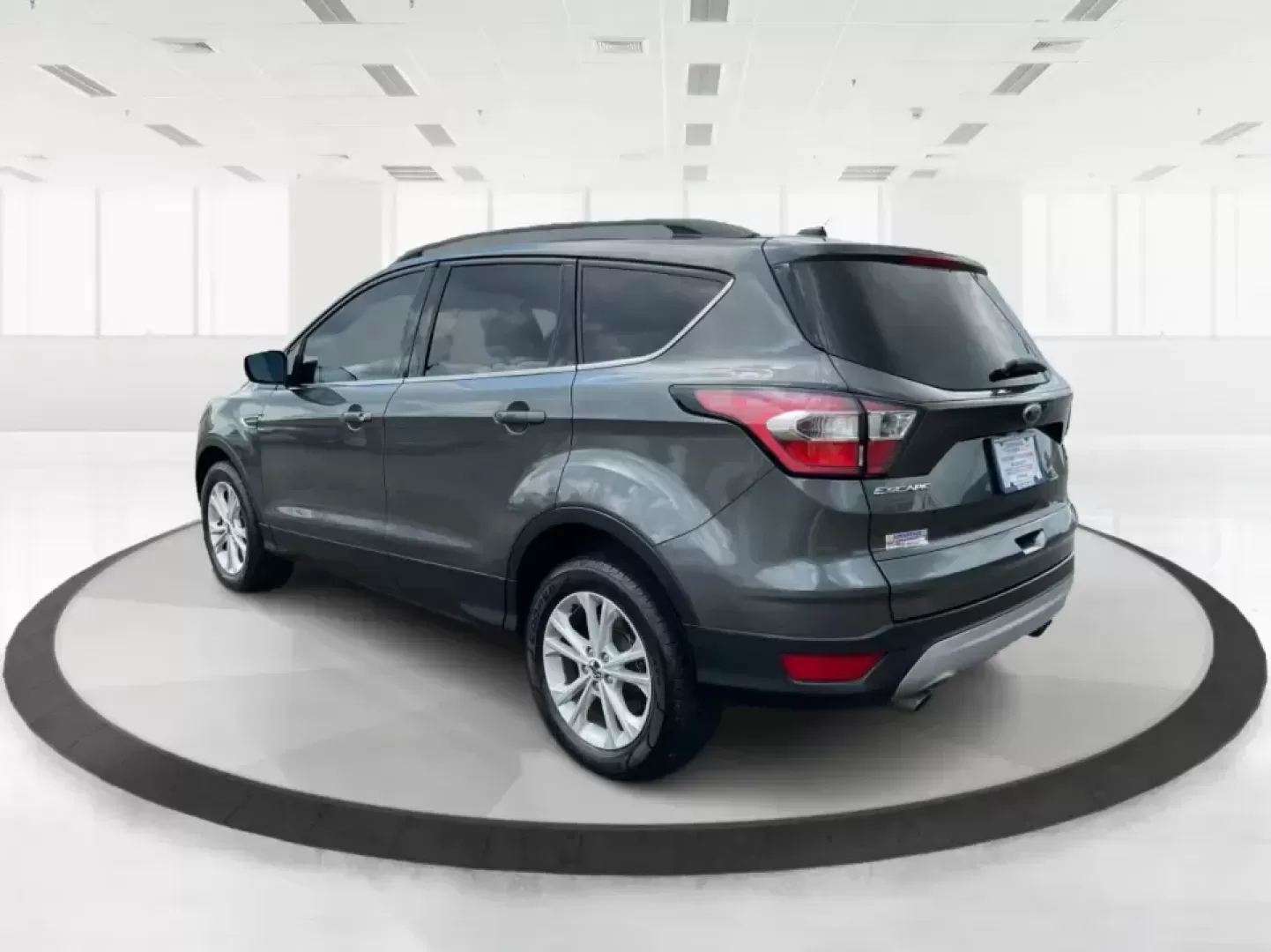 2017 Ford Escape SE (1FMCU9GD7HU) with an 1.5L L4 DOHC 16V engine, 6A transmission, located at 8750 N County Rd 25A, Piqua, OH, 45356, (937) 908-9800, 40.164391, -84.232513 - **Adventure Awaits With This 2017 Ford Escape SE! Perfect for Your Next Journey!**<br /> <br /> Are you ready to elevate your weekend getaways or daily commutes? The 2017 Ford Escape SE is the ideal SUV for those who crave versatility without sacrificing style. With a spacious interior, advanced saf - Photo#4