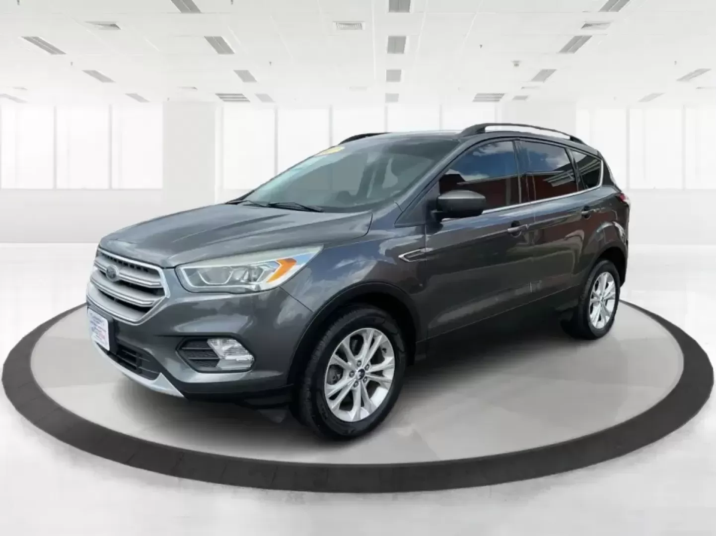 2017 Ford Escape SE (1FMCU9GD7HU) with an 1.5L L4 DOHC 16V engine, 6A transmission, located at 8750 N County Rd 25A, Piqua, OH, 45356, (937) 908-9800, 40.164391, -84.232513 - **Adventure Awaits With This 2017 Ford Escape SE! Perfect for Your Next Journey!**<br /> <br /> Are you ready to elevate your weekend getaways or daily commutes? The 2017 Ford Escape SE is the ideal SUV for those who crave versatility without sacrificing style. With a spacious interior, advanced saf - Photo#8