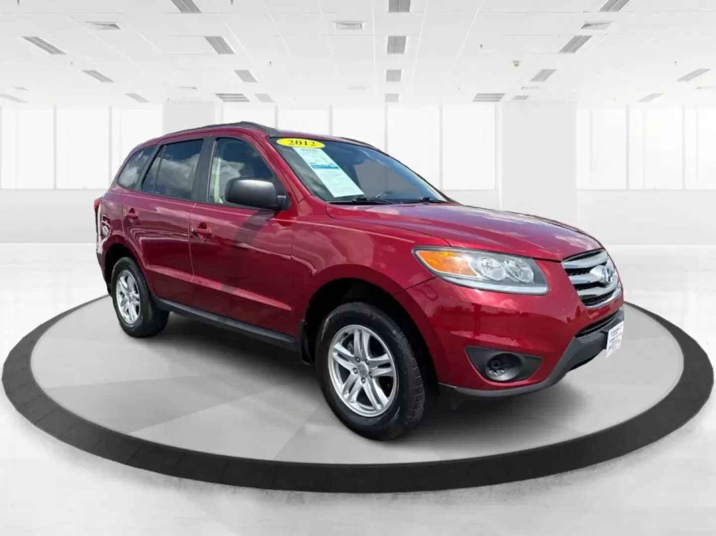 2012 Hyundai Santa Fe GLS (5XYZGDAB0CG) with an 2.4L I-4 DOHC engine, located at 4508 South Dixie Dr, Moraine, OH, 45439, (937) 908-9800, 39.689976, -84.218452 - Embark on your next adventure with the perfect blend of style, comfort, and reliability - the 2012 Hyundai Santa Fe GLS. This versatile SUV is ideal for families, commuters, and weekend warriors alike. Whether you're navigating the bustling streets of Moraine, OH, or exploring nearby attractions lik - Photo#0