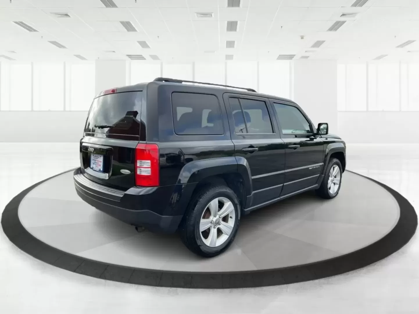 2014 Jeep Patriot Latitude (1C4NJPFA4ED) with an Other engine, located at 1099 N County Rd 25A , Troy, OH, 45373, (937) 908-9800, 40.057079, -84.212883 - **Adventure Awaits with This 2014 Jeep Patriot Latitude at Advantage Car and Credit - Moraine!**<br /> <br /> Are you ready to embark on new adventures, whether it's a weekend getaway, a family road trip, or daily commutes? This 2014 Jeep Patriot Latitude is your perfect companion for all these scen - Photo#2