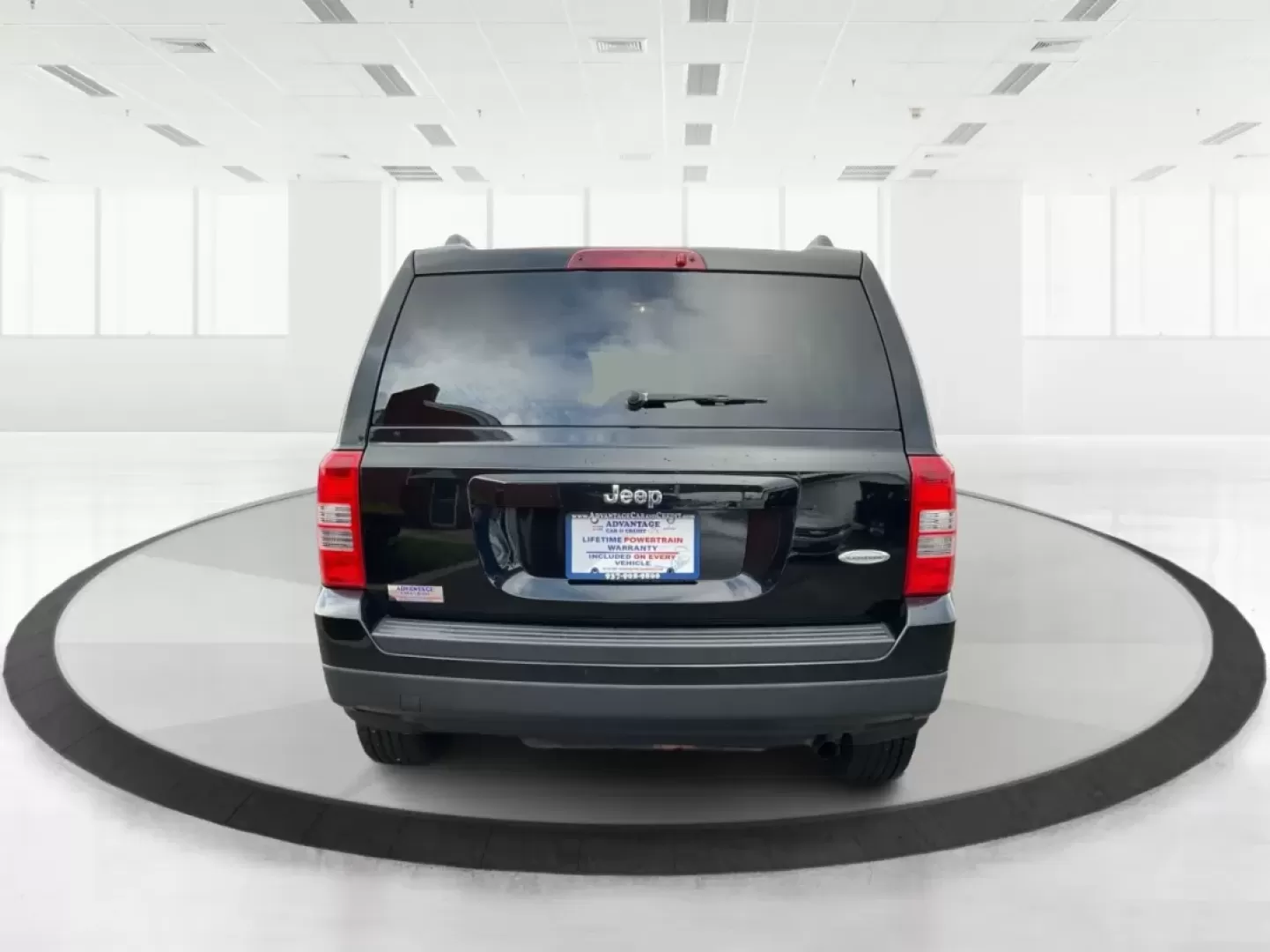 2014 Jeep Patriot Latitude (1C4NJPFA4ED) with an Other engine, located at 1099 N County Rd 25A , Troy, OH, 45373, (937) 908-9800, 40.057079, -84.212883 - **Adventure Awaits with This 2014 Jeep Patriot Latitude at Advantage Car and Credit - Moraine!**<br /> <br /> Are you ready to embark on new adventures, whether it's a weekend getaway, a family road trip, or daily commutes? This 2014 Jeep Patriot Latitude is your perfect companion for all these scen - Photo#3