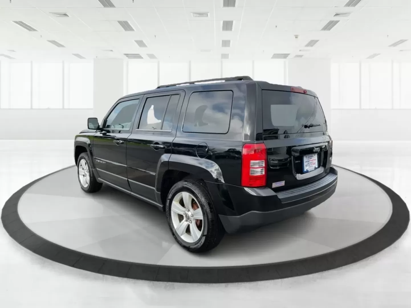 2014 Jeep Patriot Latitude (1C4NJPFA4ED) with an Other engine, located at 1099 N County Rd 25A , Troy, OH, 45373, (937) 908-9800, 40.057079, -84.212883 - **Adventure Awaits with This 2014 Jeep Patriot Latitude at Advantage Car and Credit - Moraine!**<br /> <br /> Are you ready to embark on new adventures, whether it's a weekend getaway, a family road trip, or daily commutes? This 2014 Jeep Patriot Latitude is your perfect companion for all these scen - Photo#4