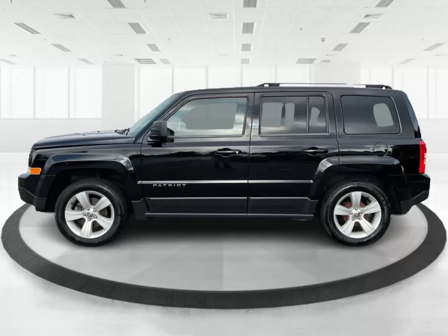 2014 Jeep Patriot Latitude (1C4NJPFA4ED) with an Other engine, located at 1099 N County Rd 25A , Troy, OH, 45373, (937) 908-9800, 40.057079, -84.212883 - **Adventure Awaits with This 2014 Jeep Patriot Latitude at Advantage Car and Credit - Moraine!**<br /> <br /> Are you ready to embark on new adventures, whether it's a weekend getaway, a family road trip, or daily commutes? This 2014 Jeep Patriot Latitude is your perfect companion for all these scen - Photo#5