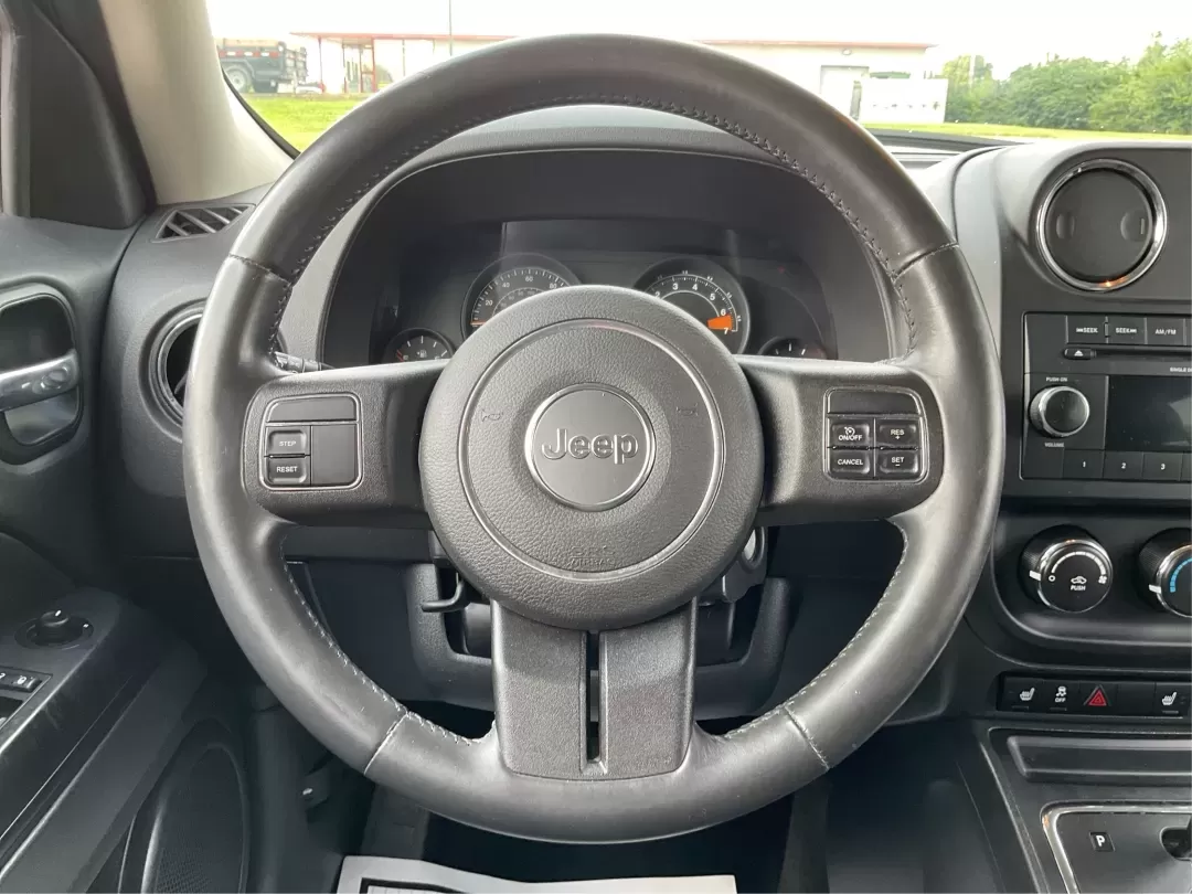 2014 Jeep Patriot Latitude (1C4NJPFA4ED) with an Other engine, located at 1099 N County Rd 25A , Troy, OH, 45373, (937) 908-9800, 40.057079, -84.212883 - **Adventure Awaits with This 2014 Jeep Patriot Latitude at Advantage Car and Credit - Moraine!**<br /> <br /> Are you ready to embark on new adventures, whether it's a weekend getaway, a family road trip, or daily commutes? This 2014 Jeep Patriot Latitude is your perfect companion for all these scen - Photo#15