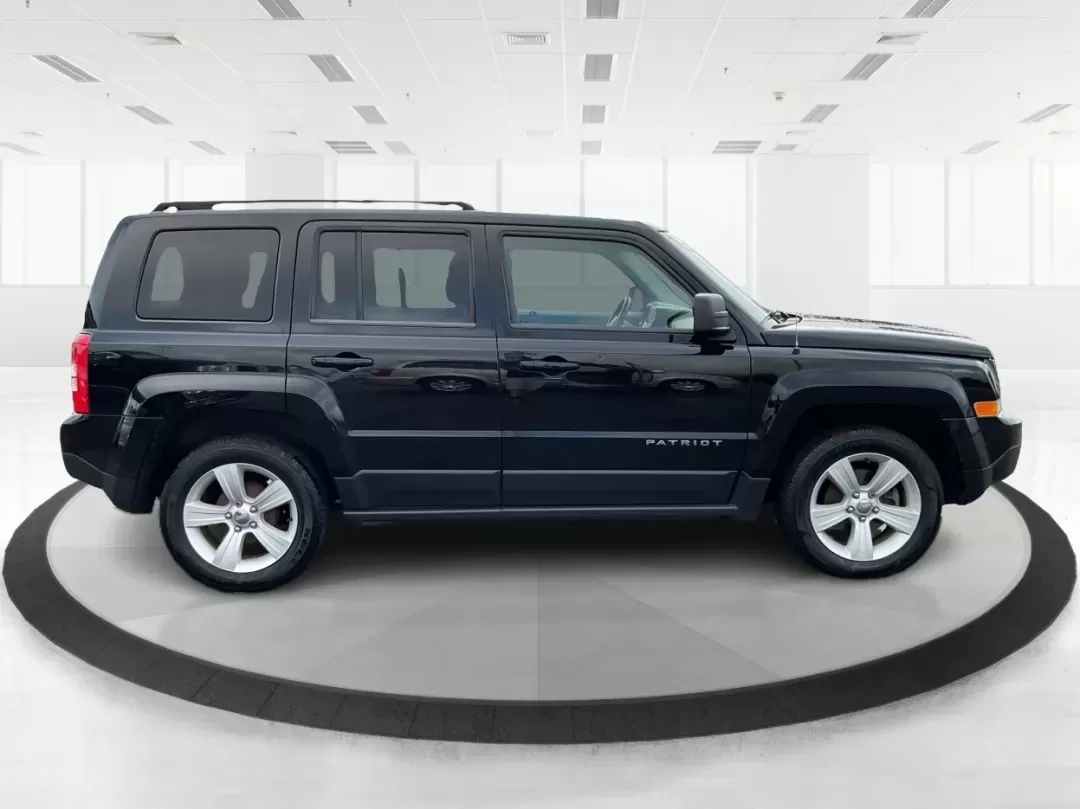2014 Jeep Patriot Latitude (1C4NJPFA4ED) with an 2.0L L4 DOHC 16V engine, Automatic transmission, located at 880 E. National Road, Vandalia, OH, 45377, (937) 908-9800, 39.891918, -84.183594 - **Adventure Awaits with This 2014 Jeep Patriot Latitude at Advantage Car and Credit - Moraine!**<br /> <br /> Are you ready to embark on new adventures, whether it's a weekend getaway, a family road trip, or daily commutes? This 2014 Jeep Patriot Latitude is your perfect companion for all these scen - Photo#1