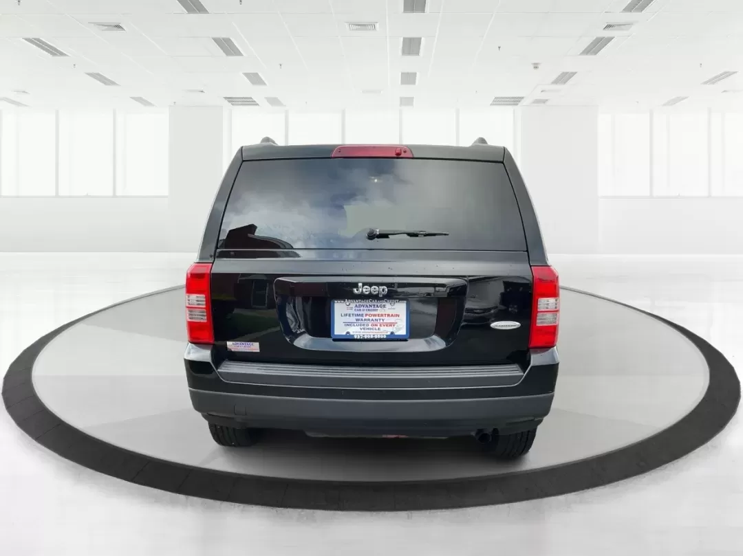 2014 Jeep Patriot Latitude (1C4NJPFA4ED) with an 2.0L L4 DOHC 16V engine, Automatic transmission, located at 880 E. National Road, Vandalia, OH, 45377, (937) 908-9800, 39.891918, -84.183594 - **Adventure Awaits with This 2014 Jeep Patriot Latitude at Advantage Car and Credit - Moraine!**<br /> <br /> Are you ready to embark on new adventures, whether it's a weekend getaway, a family road trip, or daily commutes? This 2014 Jeep Patriot Latitude is your perfect companion for all these scen - Photo#3