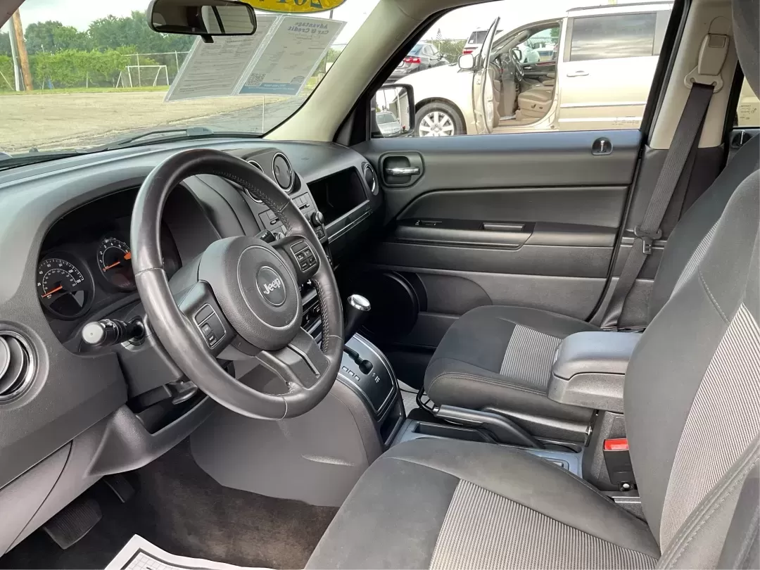 2014 Jeep Patriot Latitude (1C4NJPFA4ED) with an 2.0L L4 DOHC 16V engine, Automatic transmission, located at 880 E. National Road, Vandalia, OH, 45377, (937) 908-9800, 39.891918, -84.183594 - **Adventure Awaits with This 2014 Jeep Patriot Latitude at Advantage Car and Credit - Moraine!**<br /> <br /> Are you ready to embark on new adventures, whether it's a weekend getaway, a family road trip, or daily commutes? This 2014 Jeep Patriot Latitude is your perfect companion for all these scen - Photo#9