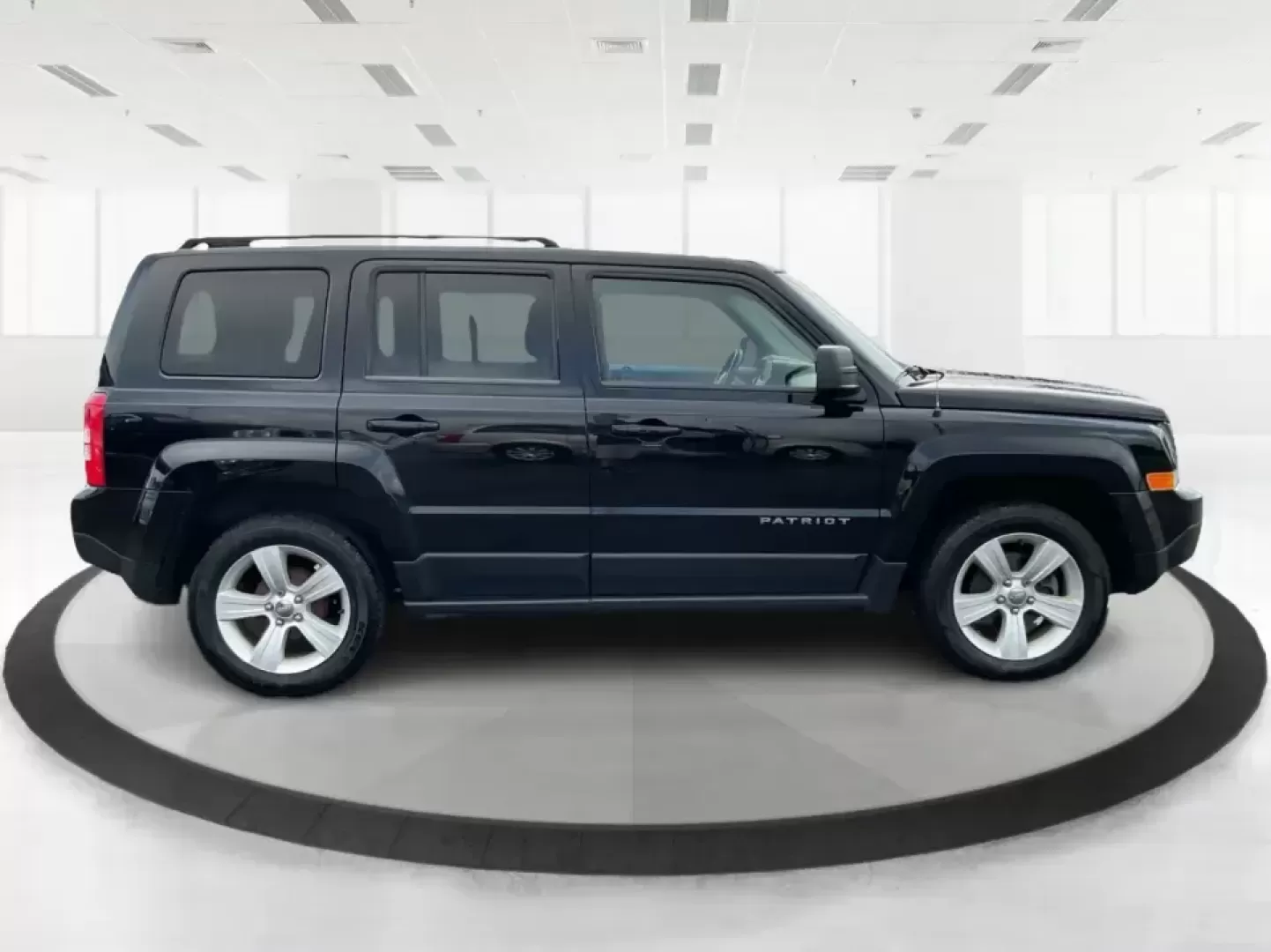 2014 Jeep Patriot Latitude (1C4NJPFA4ED) with an 2.0L L4 DOHC 16V engine, Automatic transmission, located at 880 E. National Road, Vandalia, OH, 45377, (937) 908-9800, 39.891918, -84.183594 - **Adventure Awaits with This 2014 Jeep Patriot Latitude at Advantage Car and Credit - Moraine!**<br /> <br /> Are you ready to embark on new adventures, whether it's a weekend getaway, a family road trip, or daily commutes? This 2014 Jeep Patriot Latitude is your perfect companion for all these scen - Photo#1