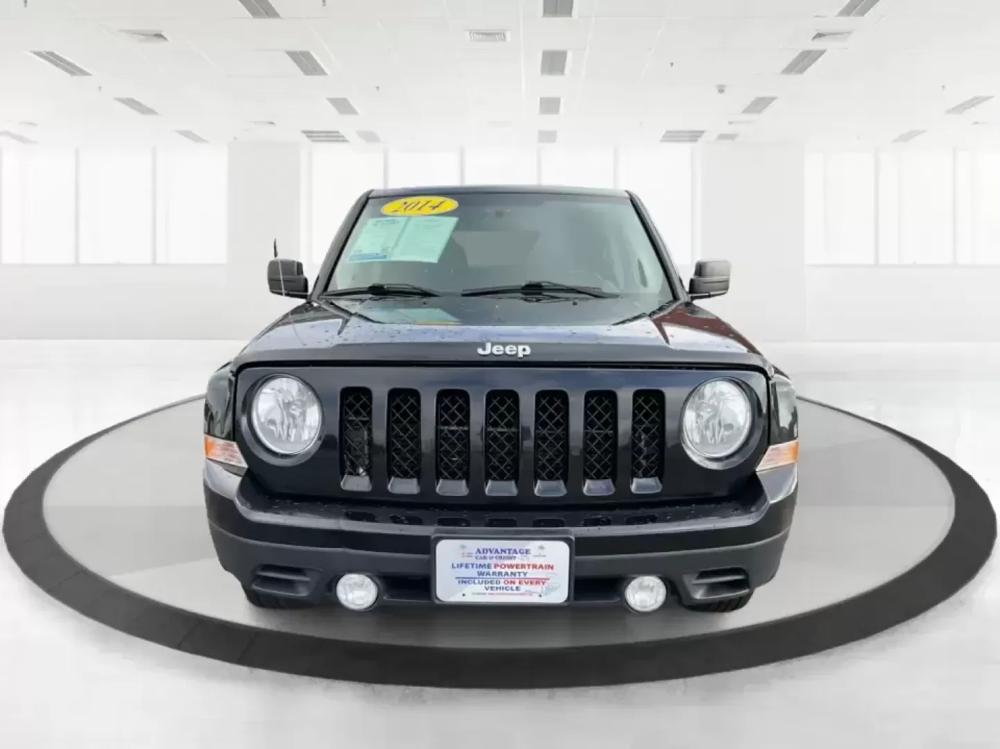 2014 Jeep Patriot Latitude (1C4NJPFA4ED) with an 2.0L L4 DOHC 16V engine, Automatic transmission, located at 880 E. National Road, Vandalia, OH, 45377, (937) 908-9800, 39.891918, -84.183594 - **Adventure Awaits with This 2014 Jeep Patriot Latitude at Advantage Car and Credit - Moraine!**<br /> <br /> Are you ready to embark on new adventures, whether it's a weekend getaway, a family road trip, or daily commutes? This 2014 Jeep Patriot Latitude is your perfect companion for all these scen - Photo#7