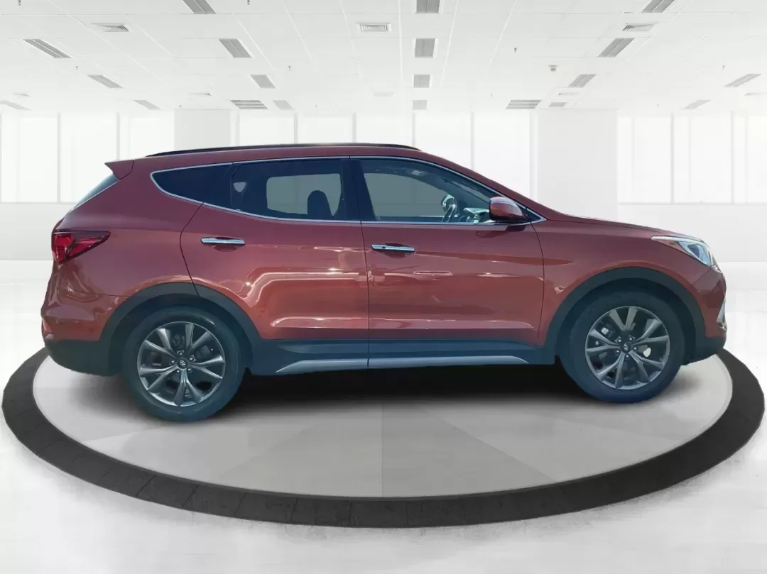 2017 Hyundai Santa Fe 2.0T Ultimate (5XYZW4LA5HG) with an Theta II 2L I-4 gasoline direct injection engine, 6A transmission, located at 8750 N County Rd 25A, Piqua, OH, 45356, (937) 908-9800, 40.164391, -84.232513 - Are you ready to elevate your family adventures or commute comfortably while tackling any road with confidence? Look no further than this 2017 Hyundai Santa Fe 2.0T Ultimate, available now at Advantage Car and Credit in Fairborn, OH. This SUV is not just a vehicle; it's your ticket to creating unfor - Photo#1