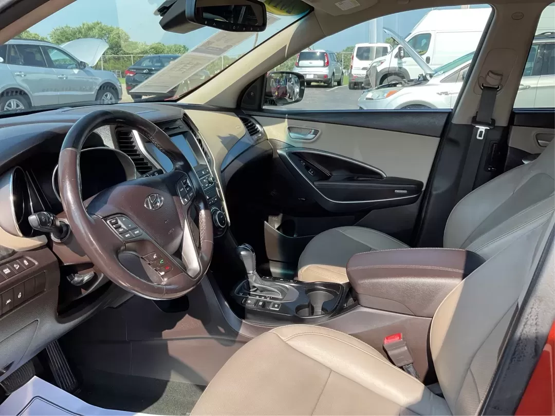 2017 Hyundai Santa Fe 2.0T Ultimate (5XYZW4LA5HG) with an Theta II 2L I-4 gasoline direct injection engine, 6A transmission, located at 8750 N County Rd 25A, Piqua, OH, 45356, (937) 908-9800, 40.164391, -84.232513 - Are you ready to elevate your family adventures or commute comfortably while tackling any road with confidence? Look no further than this 2017 Hyundai Santa Fe 2.0T Ultimate, available now at Advantage Car and Credit in Fairborn, OH. This SUV is not just a vehicle; it's your ticket to creating unfor - Photo#9