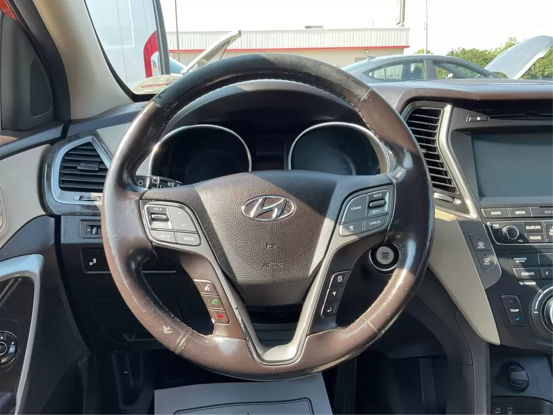 2017 Hyundai Santa Fe 2.0T Ultimate (5XYZW4LA5HG) with an Theta II 2L I-4 gasoline direct injection engine, 6A transmission, located at 8750 N County Rd 25A, Piqua, OH, 45356, (937) 908-9800, 40.164391, -84.232513 - Are you ready to elevate your family adventures or commute comfortably while tackling any road with confidence? Look no further than this 2017 Hyundai Santa Fe 2.0T Ultimate, available now at Advantage Car and Credit in Fairborn, OH. This SUV is not just a vehicle; it's your ticket to creating unfor - Photo#16
