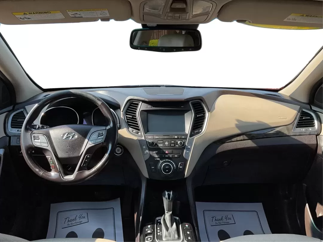 2017 Hyundai Santa Fe 2.0T Ultimate (5XYZW4LA5HG) with an Theta II 2L I-4 gasoline direct injection engine, 6A transmission, located at 8750 N County Rd 25A, Piqua, OH, 45356, (937) 908-9800, 40.164391, -84.232513 - Are you ready to elevate your family adventures or commute comfortably while tackling any road with confidence? Look no further than this 2017 Hyundai Santa Fe 2.0T Ultimate, available now at Advantage Car and Credit in Fairborn, OH. This SUV is not just a vehicle; it's your ticket to creating unfor - Photo#20