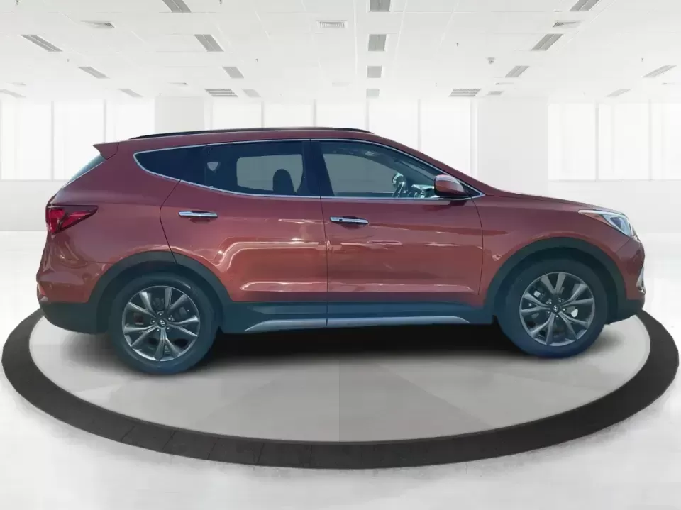 2017 Hyundai Santa Fe 2.0T Ultimate (5XYZW4LA5HG) with an Theta II 2L I-4 gasoline direct injection engine, 6A transmission, located at 880 E. National Road, Vandalia, OH, 45377, (937) 908-9800, 39.891918, -84.183594 - Are you ready to elevate your family adventures or commute comfortably while tackling any road with confidence? Look no further than this 2017 Hyundai Santa Fe 2.0T Ultimate, available now at Advantage Car and Credit in Fairborn, OH. This SUV is not just a vehicle; it's your ticket to creating unfor - Photo#1