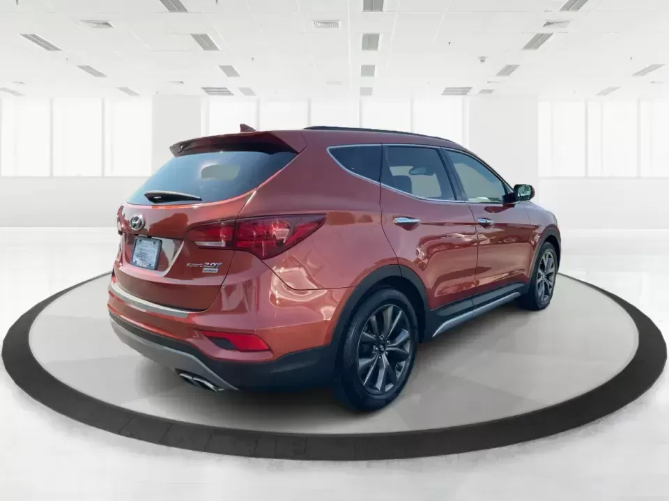 2017 Hyundai Santa Fe 2.0T Ultimate (5XYZW4LA5HG) with an Theta II 2L I-4 gasoline direct injection engine, 6A transmission, located at 880 E. National Road, Vandalia, OH, 45377, (937) 908-9800, 39.891918, -84.183594 - Are you ready to elevate your family adventures or commute comfortably while tackling any road with confidence? Look no further than this 2017 Hyundai Santa Fe 2.0T Ultimate, available now at Advantage Car and Credit in Fairborn, OH. This SUV is not just a vehicle; it's your ticket to creating unfor - Photo#2