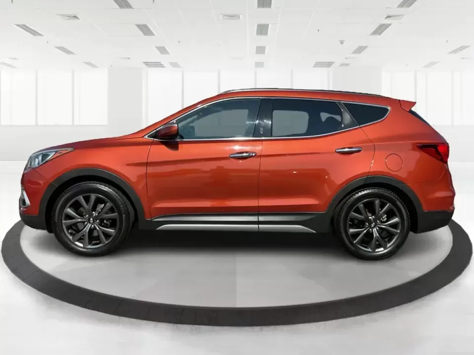 2017 Hyundai Santa Fe 2.0T Ultimate (5XYZW4LA5HG) with an Theta II 2L I-4 gasoline direct injection engine, 6A transmission, located at 880 E. National Road, Vandalia, OH, 45377, (937) 908-9800, 39.891918, -84.183594 - Are you ready to elevate your family adventures or commute comfortably while tackling any road with confidence? Look no further than this 2017 Hyundai Santa Fe 2.0T Ultimate, available now at Advantage Car and Credit in Fairborn, OH. This SUV is not just a vehicle; it's your ticket to creating unfor - Photo#5
