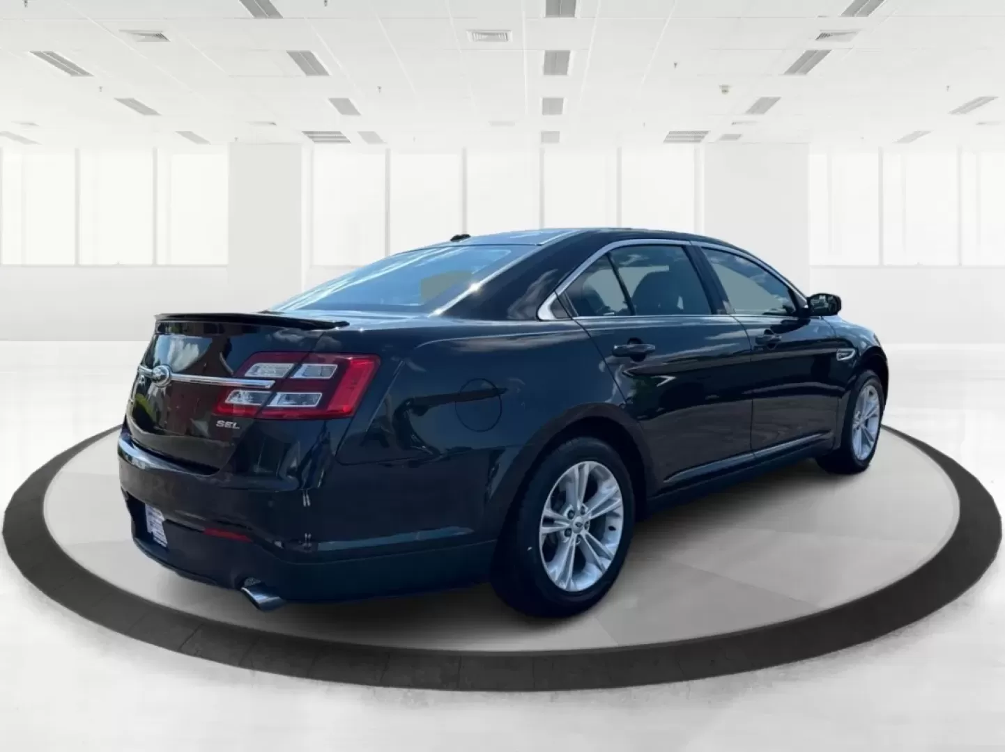 2013 Ford Taurus SEL (1FAHP2E87DG) with an EcoBoost 2L I-4 gasoline direct injection engine, located at 1099 N County Rd 25A , Troy, OH, 45373, (937) 908-9800, 40.057079, -84.212883 - ### Discover Your Next Adventure with the 2013 Ford Taurus SEL from Advantage Car and Credit!<br /> <br /> Are you seeking a reliable and stylish sedan for your daily commute, family road trips, or weekend adventures? Look no further! The 2013 Ford Taurus SEL, available at Advantage Car and Credit i - Photo#2