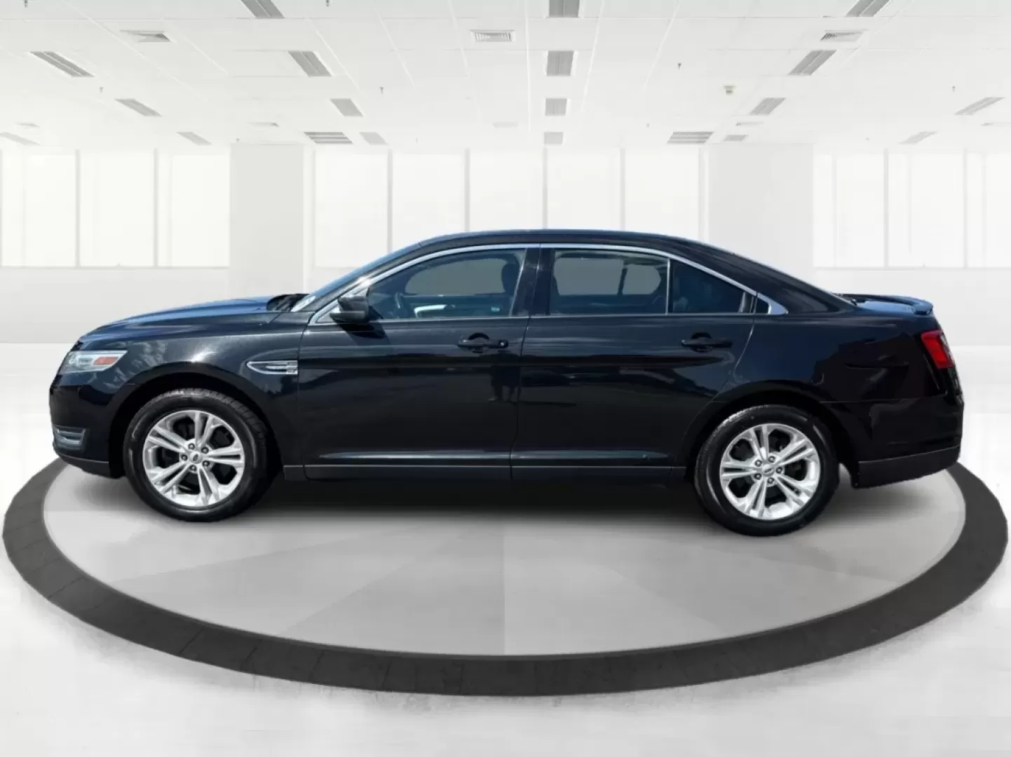 2013 Ford Taurus SEL (1FAHP2E87DG) with an EcoBoost 2L I-4 gasoline direct injection engine, located at 1099 N County Rd 25A , Troy, OH, 45373, (937) 908-9800, 40.057079, -84.212883 - ### Discover Your Next Adventure with the 2013 Ford Taurus SEL from Advantage Car and Credit!<br /> <br /> Are you seeking a reliable and stylish sedan for your daily commute, family road trips, or weekend adventures? Look no further! The 2013 Ford Taurus SEL, available at Advantage Car and Credit i - Photo#5