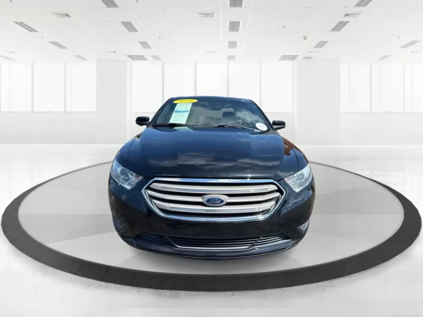 2013 Ford Taurus SEL (1FAHP2E87DG) with an EcoBoost 2L I-4 gasoline direct injection engine, located at 1099 N County Rd 25A , Troy, OH, 45373, (937) 908-9800, 40.057079, -84.212883 - ### Discover Your Next Adventure with the 2013 Ford Taurus SEL from Advantage Car and Credit!<br /> <br /> Are you seeking a reliable and stylish sedan for your daily commute, family road trips, or weekend adventures? Look no further! The 2013 Ford Taurus SEL, available at Advantage Car and Credit i - Photo#7