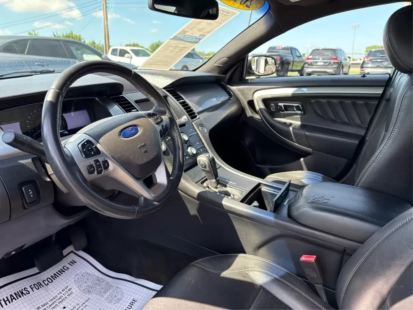2013 Ford Taurus SEL (1FAHP2E87DG) with an EcoBoost 2L I-4 gasoline direct injection engine, located at 1099 N County Rd 25A , Troy, OH, 45373, (937) 908-9800, 40.057079, -84.212883 - ### Discover Your Next Adventure with the 2013 Ford Taurus SEL from Advantage Car and Credit!<br /> <br /> Are you seeking a reliable and stylish sedan for your daily commute, family road trips, or weekend adventures? Look no further! The 2013 Ford Taurus SEL, available at Advantage Car and Credit i - Photo#9