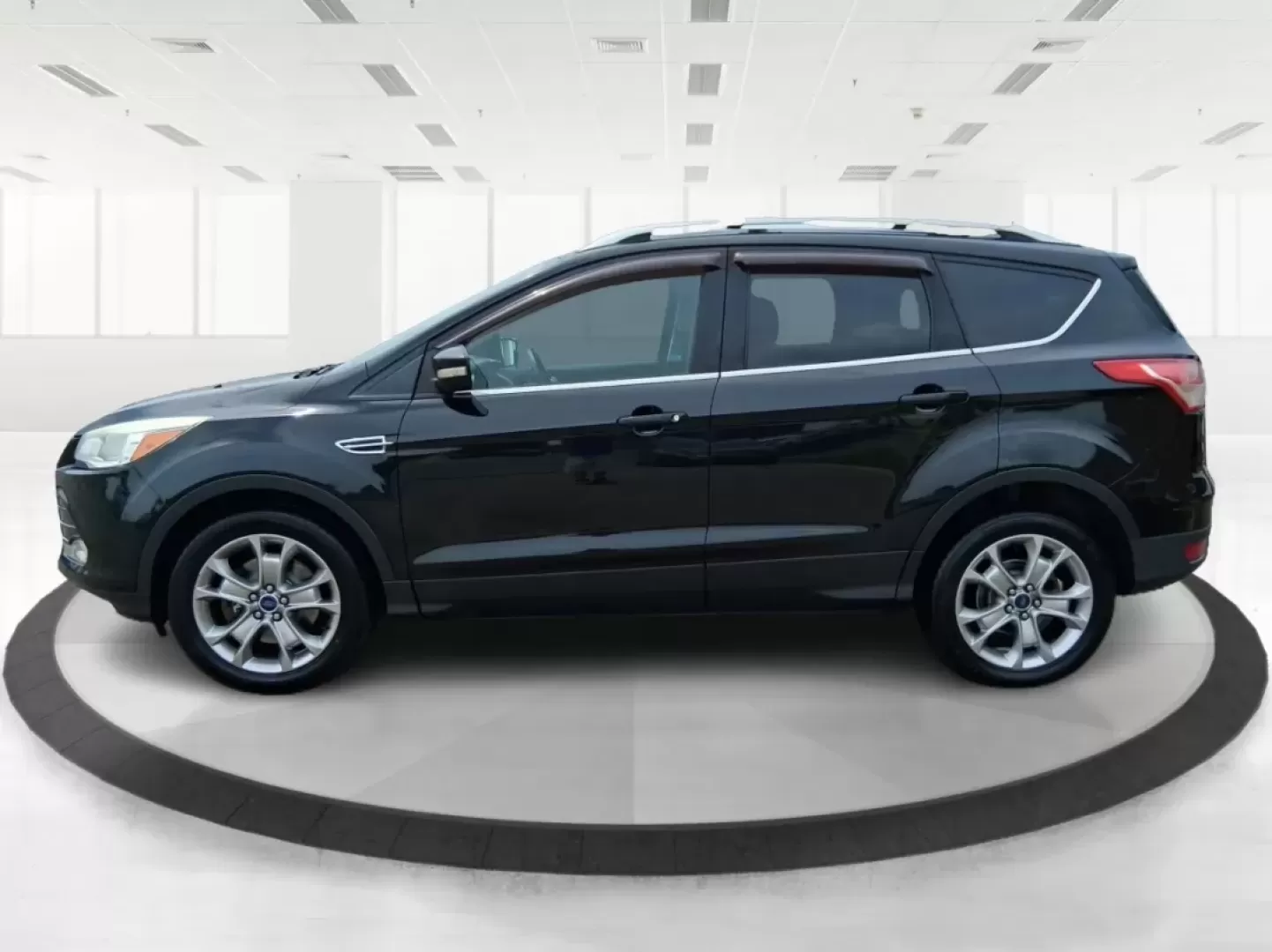 2014 Ford Escape Titanium (1FMCU9J96EU) with an EcoBoost 1.6L I-4 gasoline direct injection engine, located at 4508 South Dixie Dr, Moraine, OH, 45439, (937) 908-9800, 39.689976, -84.218452 - **Unleash Adventure with the 2014 Ford Escape Titanium: Your Ideal Family SUV!**<br /> <br /> Are you ready to take on the open road for your next family getaway or weekend adventure? Look no further than the 2014 Ford Escape Titanium, a versatile SUV that combines style, comfort, and functionality, - Photo#5