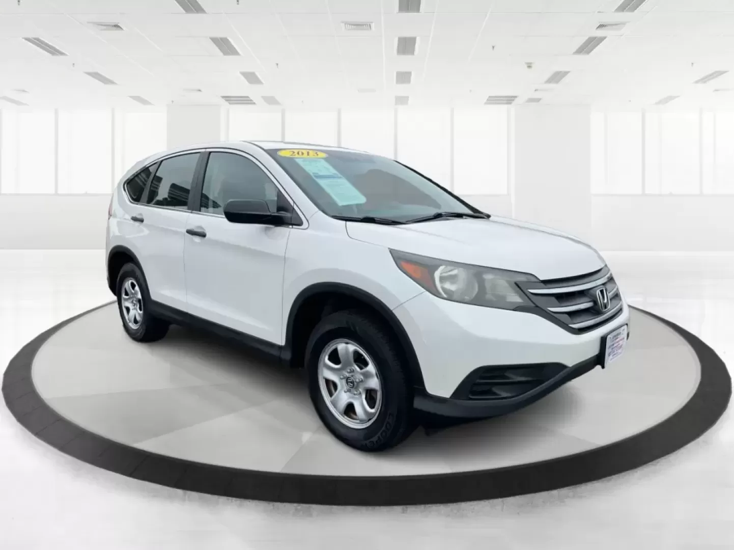 2013 Honda CR-V LX (5J6RM3H37DL) with an 2.4L I-4 DOHC engine, located at 1099 N County Rd 25A , Troy, OH, 45373, (937) 908-9800, 40.057079, -84.212883 - If you're searching for a reliable vehicle that perfectly balances space, comfort, and efficiency for your family or daily commute, look no further than this 2013 Honda CR-V LX, proudly offered by Advantage Car and Credit in Fairborn, OH. Located conveniently at 1184 Kauffman Ave, we specialize in * - Photo#0