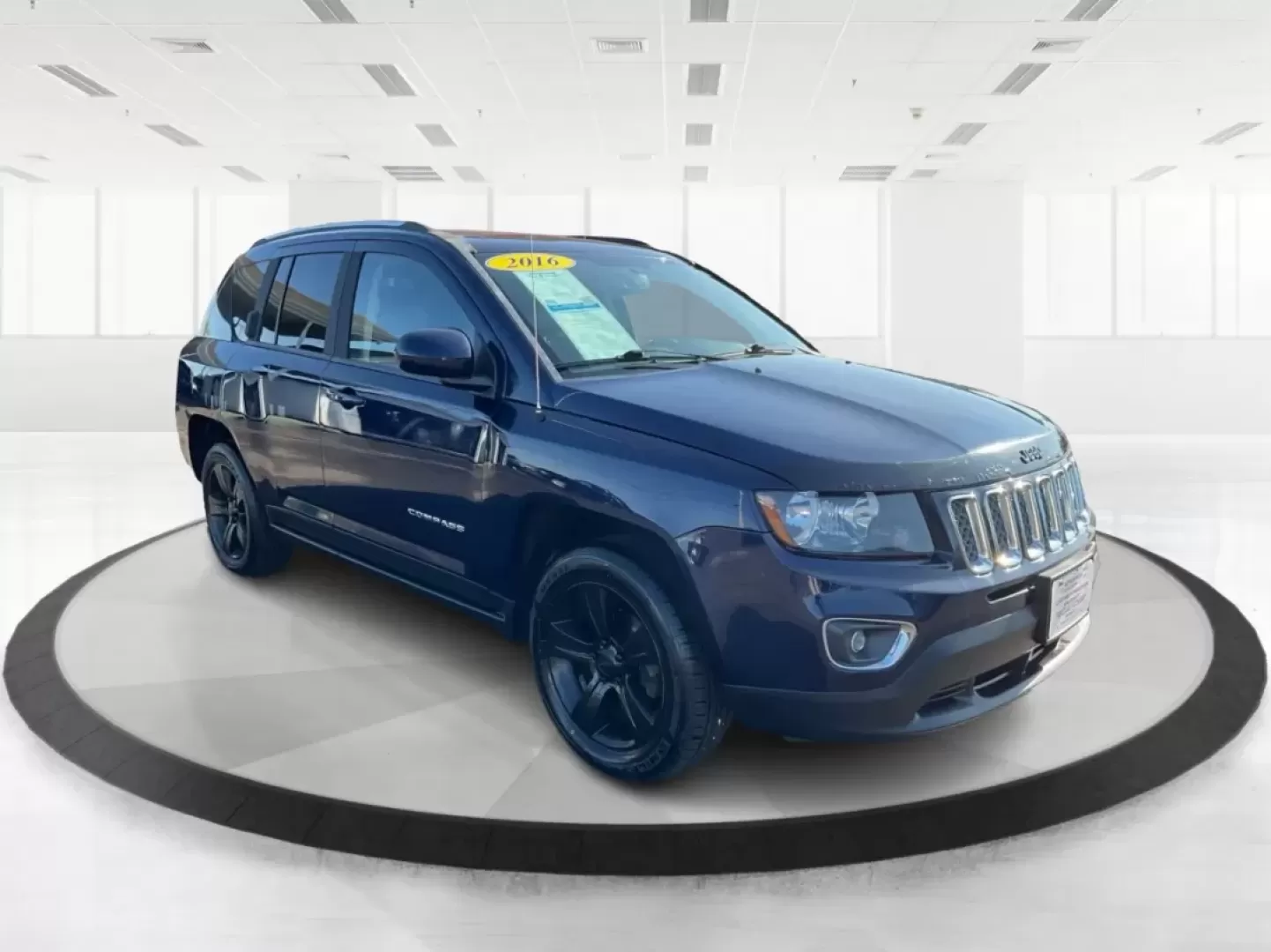 2016 Jeep Compass Latitude 4WD (1C4NJDEB7GD) with an 2.4L L4 DOHC 16V engine, 6-Speed Automatic transmission, located at 880 E. National Road, Vandalia, OH, 45377, (937) 908-9800, 39.891918, -84.183594 - **Discover Adventure with the 2016 Jeep Compass Latitude 4WD at Advantage Car and Credit!**<br /> <br /> Are you ready to embrace your next adventure? Whether you're planning a weekend getaway, commuting to work, or navigating your family through busy city streets, the 2016 Jeep Compass Latitude 4WD - Photo#0