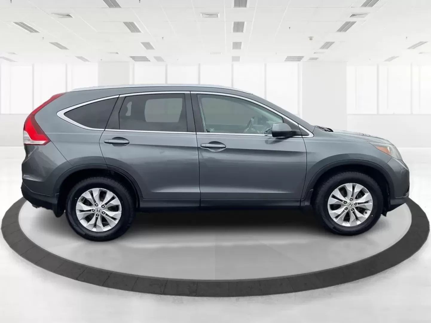 2012 Honda CR-V EX-L 4WD 5-Speed AT (2HKRM3H75CH) with an Other engine, located at 1951 S Dayton Lakeview Rd., New Carlisle, OH, 45344, (937) 908-9800, 39.890999, -84.050255 - Are you ready to elevate your adventures and daily commutes with a reliable vehicle? The 2012 Honda CR-V EX-L is perfect for individuals and families alike, offering a comfortable ride with ample space and versatile features. Whether you're navigating the bustling streets of Fairborn, OH, or heading - Photo#1