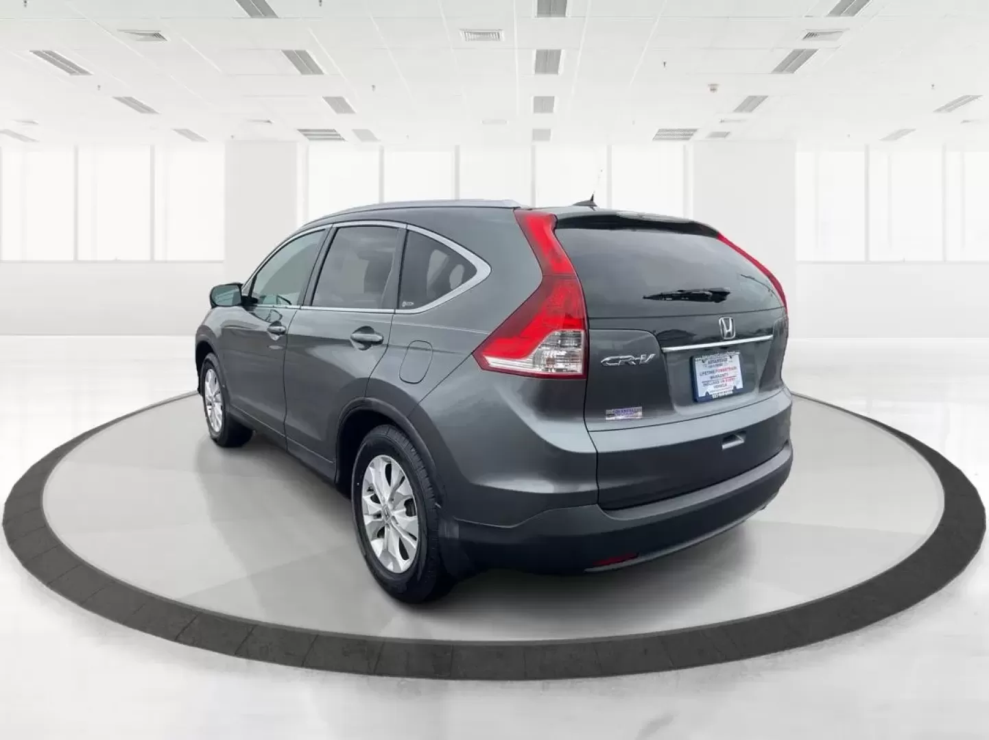 2012 Honda CR-V EX-L 4WD 5-Speed AT (2HKRM3H75CH) with an Other engine, located at 1099 N County Rd 25A , Troy, OH, 45373, (937) 908-9800, 40.057079, -84.212883 - Are you ready to elevate your adventures and daily commutes with a reliable vehicle? The 2012 Honda CR-V EX-L is perfect for individuals and families alike, offering a comfortable ride with ample space and versatile features. Whether you're navigating the bustling streets of Fairborn, OH, or heading - Photo#4