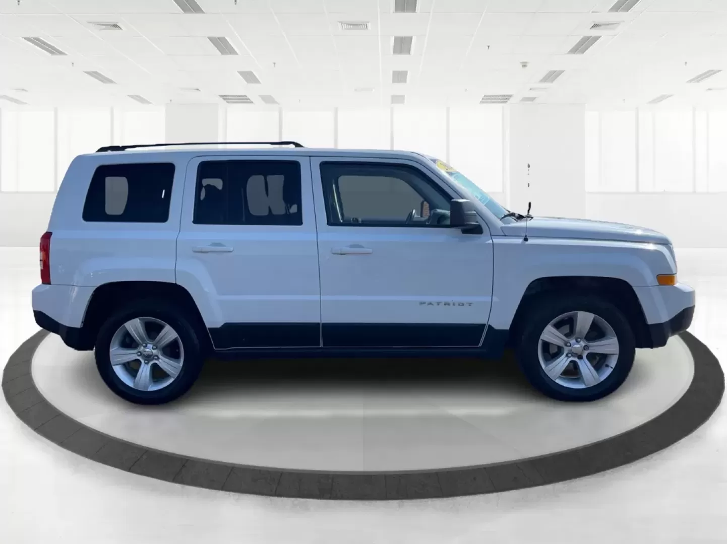 2014 Jeep Patriot Latitude (1C4NJPFB0ED) with an 2.4L I-4 DOHC engine, located at 880 E. National Road, Vandalia, OH, 45377, (937) 908-9800, 39.891918, -84.183594 - **Adventure Awaits with This 2014 Jeep Patriot Latitude! Perfect for Road Trips and Family Outings!**<br /> <br /> Explore the open road with confidence and comfort in this 2014 Jeep Patriot Latitude, now available at Advantage Car and Credit in Fairborn, OH. This SUV is the ideal companion for grow - Photo#1
