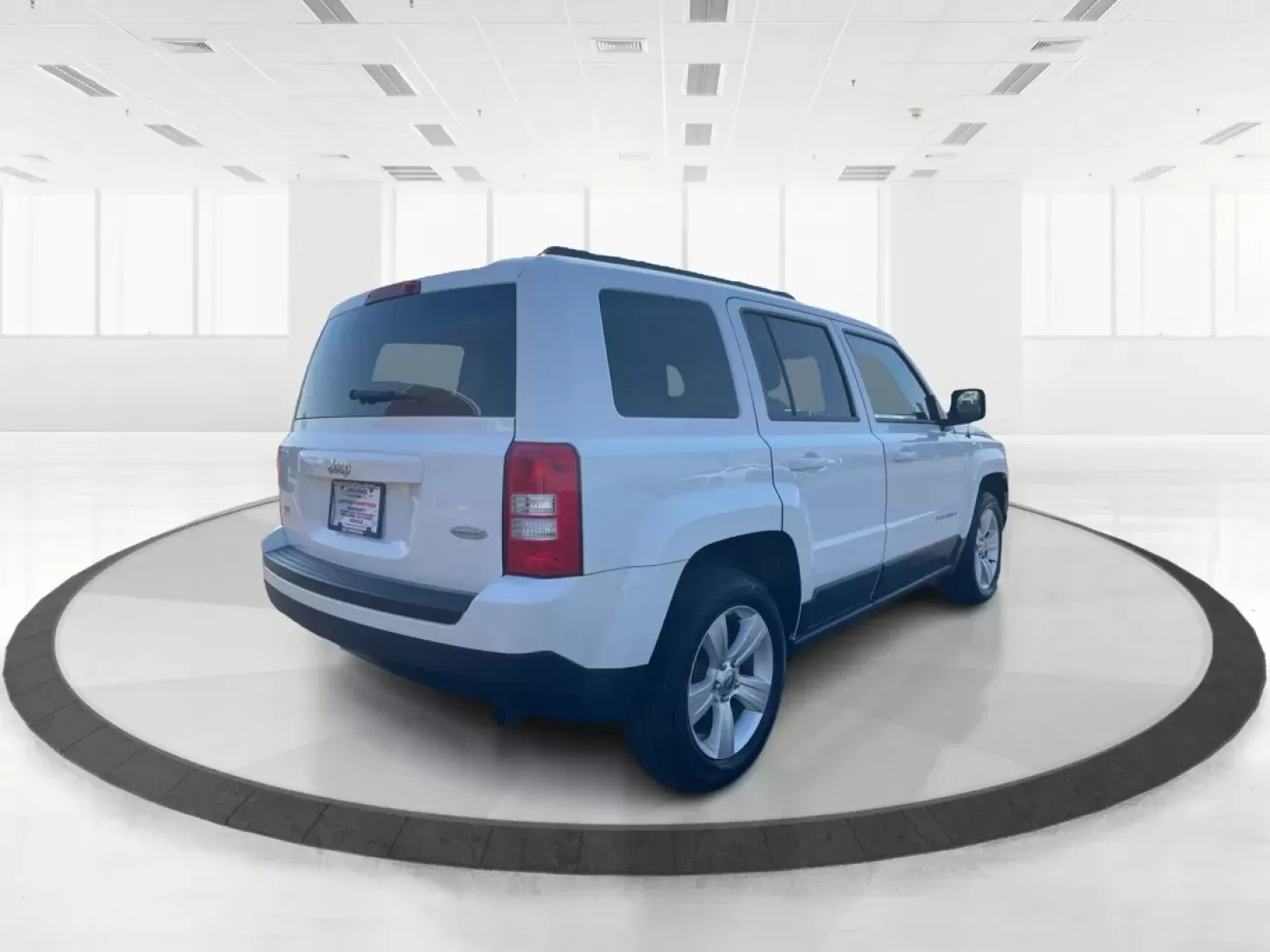 2014 Jeep Patriot Latitude (1C4NJPFB0ED) with an 2.4L I-4 DOHC engine, located at 880 E. National Road, Vandalia, OH, 45377, (937) 908-9800, 39.891918, -84.183594 - **Adventure Awaits with This 2014 Jeep Patriot Latitude! Perfect for Road Trips and Family Outings!**<br /> <br /> Explore the open road with confidence and comfort in this 2014 Jeep Patriot Latitude, now available at Advantage Car and Credit in Fairborn, OH. This SUV is the ideal companion for grow - Photo#2