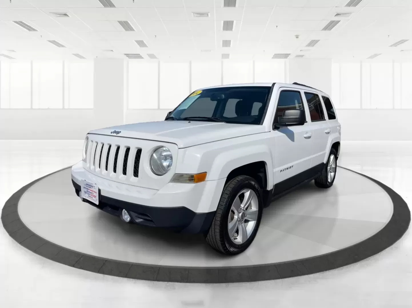 2014 Jeep Patriot Latitude (1C4NJPFB0ED) with an 2.4L I-4 DOHC engine, located at 880 E. National Road, Vandalia, OH, 45377, (937) 908-9800, 39.891918, -84.183594 - **Adventure Awaits with This 2014 Jeep Patriot Latitude! Perfect for Road Trips and Family Outings!**<br /> <br /> Explore the open road with confidence and comfort in this 2014 Jeep Patriot Latitude, now available at Advantage Car and Credit in Fairborn, OH. This SUV is the ideal companion for grow - Photo#8