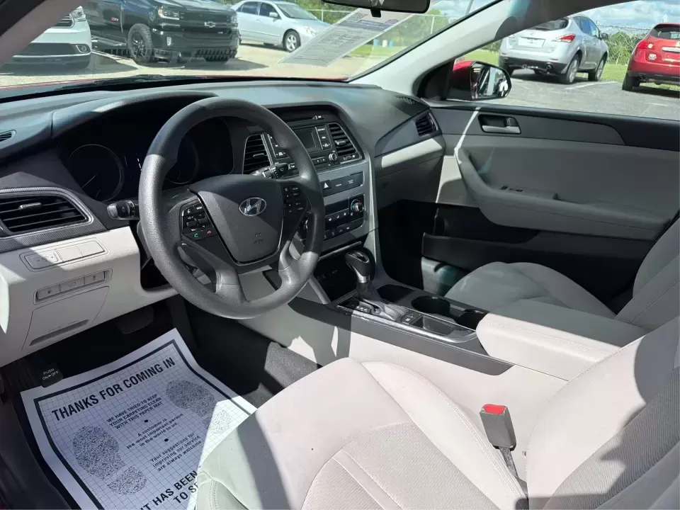 2017 Hyundai Sonata SE (5NPE24AF8HH) with an 2.4L L4 DOHC 16V engine, 7A transmission, located at 1099 N County Rd 25A , Troy, OH, 45373, (937) 908-9800, 40.057079, -84.212883 - Need a reliable, comfortable sedan for the daily drive from Troy to Dayton, school drop-offs, or quick weekend getaways to Charleston Falls Preserve? This red 2017 Hyundai Sonata Base is built for real life-easy to park downtown near the Miami County Courthouse, smooth on I75, and efficient enough f - Photo#9