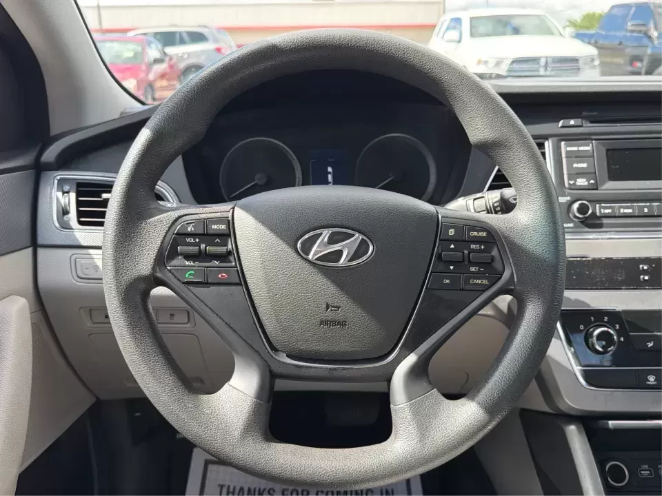 2017 Hyundai Sonata SE (5NPE24AF8HH) with an 2.4L L4 DOHC 16V engine, 7A transmission, located at 1099 N County Rd 25A , Troy, OH, 45373, (937) 908-9800, 40.057079, -84.212883 - Need a reliable, comfortable sedan for the daily drive from Troy to Dayton, school drop-offs, or quick weekend getaways to Charleston Falls Preserve? This red 2017 Hyundai Sonata Base is built for real life-easy to park downtown near the Miami County Courthouse, smooth on I75, and efficient enough f - Photo#16