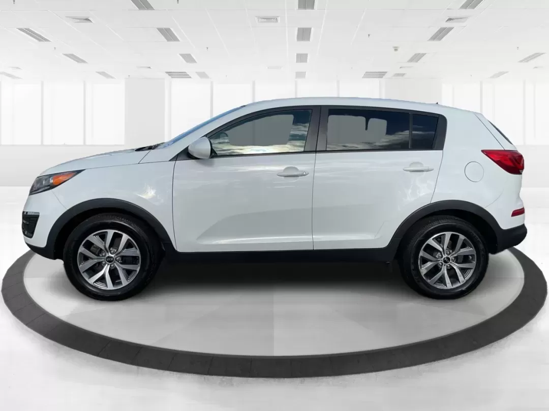 2015 Kia Sportage LX (KNDPB3AC1F7) with an Other engine, located at 4508 South Dixie Dr, Moraine, OH, 45439, (937) 908-9800, 39.689976, -84.218452 - Are you looking for a versatile vehicle that can handle your family's daily adventures while also being budget-friendly? Look no further than this 2015 Kia Sportage LX, now available at Advantage Car and Credit in Fairborn, OH. This stylish crossover SUV is perfect for growing families, weekend geta - Photo#4
