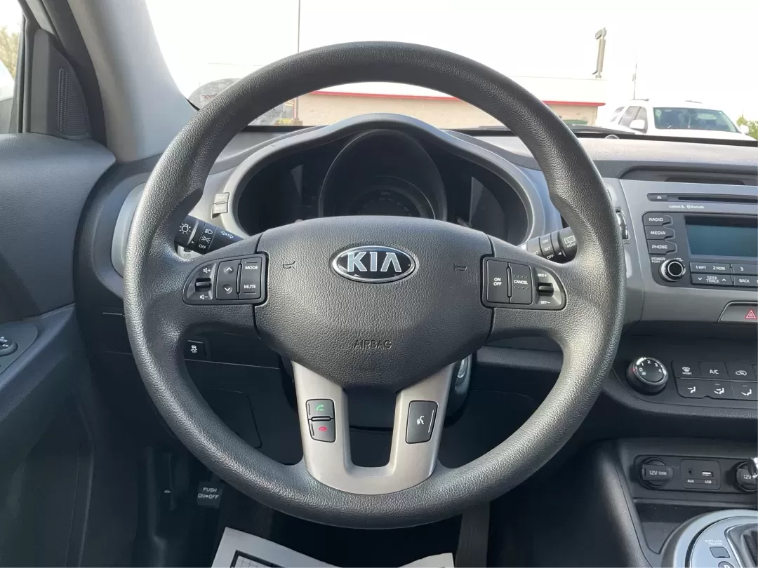 2015 Kia Sportage LX (KNDPB3AC1F7) with an Other engine, located at 4508 South Dixie Dr, Moraine, OH, 45439, (937) 908-9800, 39.689976, -84.218452 - Are you looking for a versatile vehicle that can handle your family's daily adventures while also being budget-friendly? Look no further than this 2015 Kia Sportage LX, now available at Advantage Car and Credit in Fairborn, OH. This stylish crossover SUV is perfect for growing families, weekend geta - Photo#15