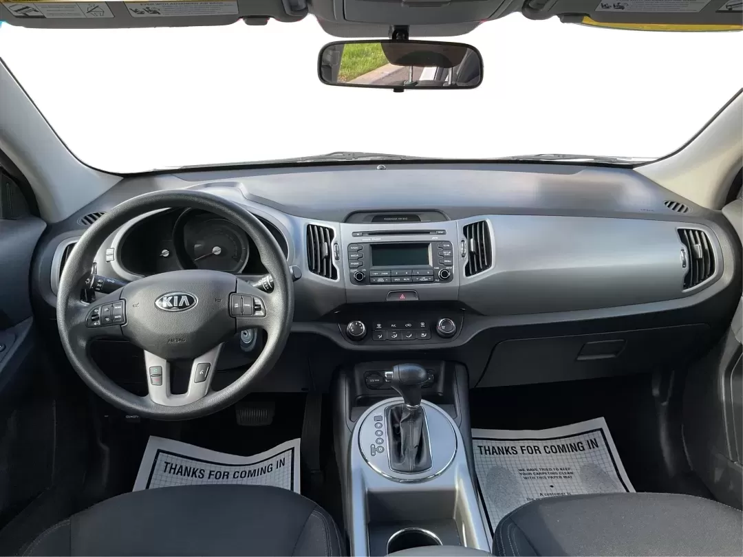 2015 Kia Sportage LX (KNDPB3AC1F7) with an Other engine, located at 8750 N County Rd 25A, Piqua, OH, 45356, (937) 908-9800, 40.164391, -84.232513 - Are you looking for a versatile vehicle that can handle your family's daily adventures while also being budget-friendly? Look no further than this 2015 Kia Sportage LX, now available at Advantage Car and Credit in Fairborn, OH. This stylish crossover SUV is perfect for growing families, weekend geta - Photo#18