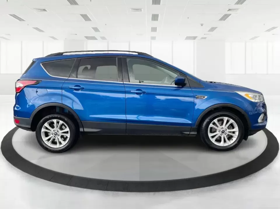 2017 Ford Escape SE (1FMCU0GD5HU) with an 1.5L L4 DOHC 16V engine, 6A transmission, located at 1951 S Dayton Lakeview Rd., New Carlisle, OH, 45344, (937) 908-9800, 39.890999, -84.050255 - **Adventure Awaits in This 2017 Ford Escape SE Perfect for Your Ohio Lifestyle!**<br /> <br /> Are you ready to embrace the open road? Whether you're commuting to work, taking the kids to soccer practice, or planning a weekend getaway to nearby attractions like the National Museum of the U.S. Air F - Photo#1