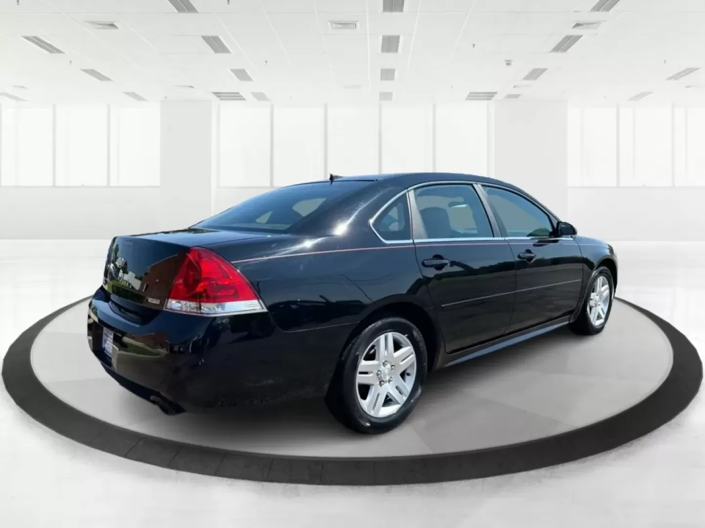 2014 Chevrolet Impala Limited LT (2G1WB5E3XE1) with an 3.6L V-6 gasoline direct injection engine, located at 8750 N County Rd 25A, Piqua, OH, 45356, (937) 908-9800, 40.164391, -84.232513 - Are you ready for your next adventure, whether it's a family road trip, a daily commute, or simply running errands around Fairborn? The 2014 Chevrolet Impala Limited LT is the perfect sedan to elevate your driving experience. With its stylish black exterior and reliable performance, this vehicle is - Photo#2