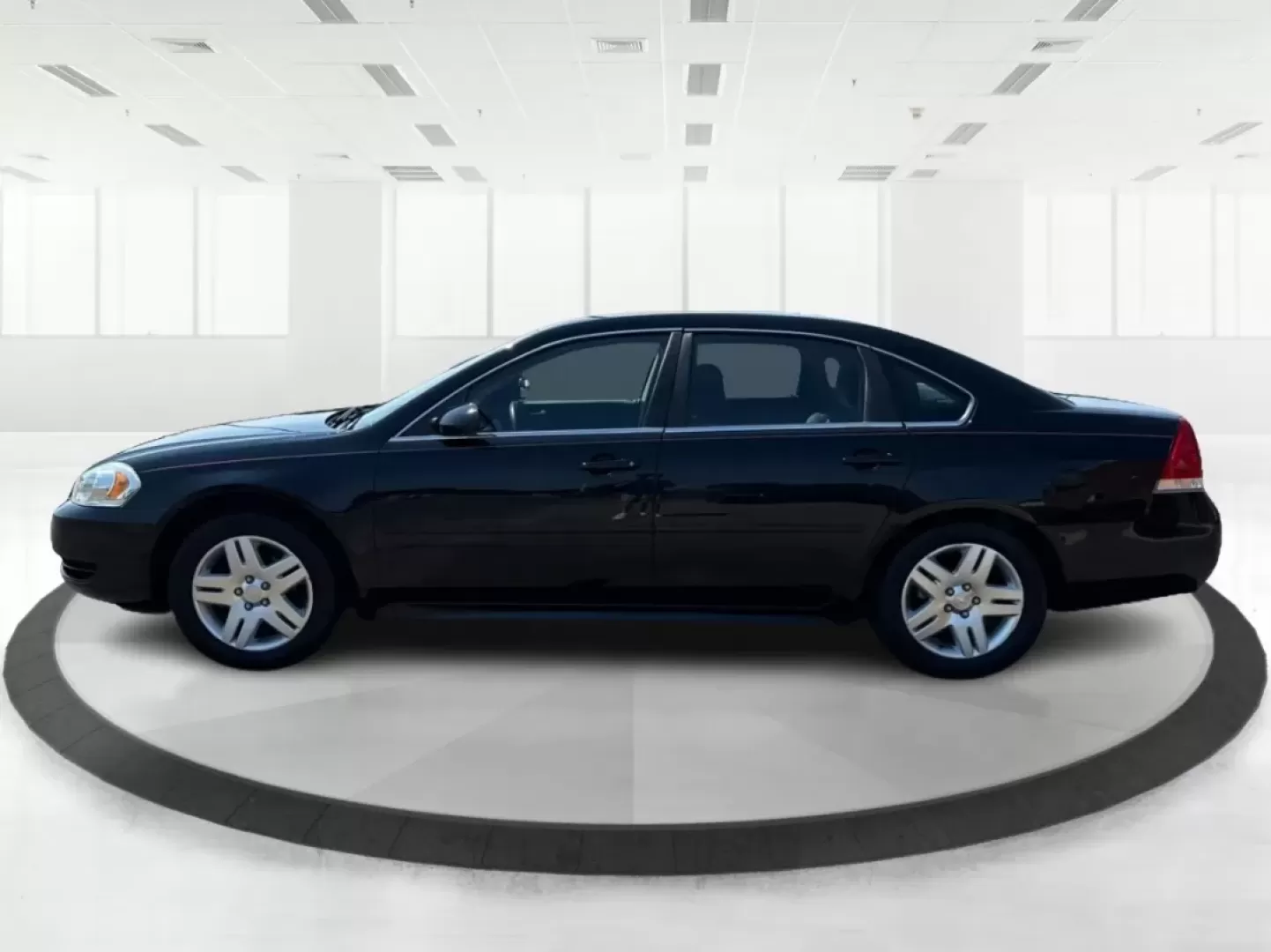 2014 Chevrolet Impala Limited LT (2G1WB5E3XE1) with an 3.6L V-6 gasoline direct injection engine, located at 8750 N County Rd 25A, Piqua, OH, 45356, (937) 908-9800, 40.164391, -84.232513 - Are you ready for your next adventure, whether it's a family road trip, a daily commute, or simply running errands around Fairborn? The 2014 Chevrolet Impala Limited LT is the perfect sedan to elevate your driving experience. With its stylish black exterior and reliable performance, this vehicle is - Photo#5