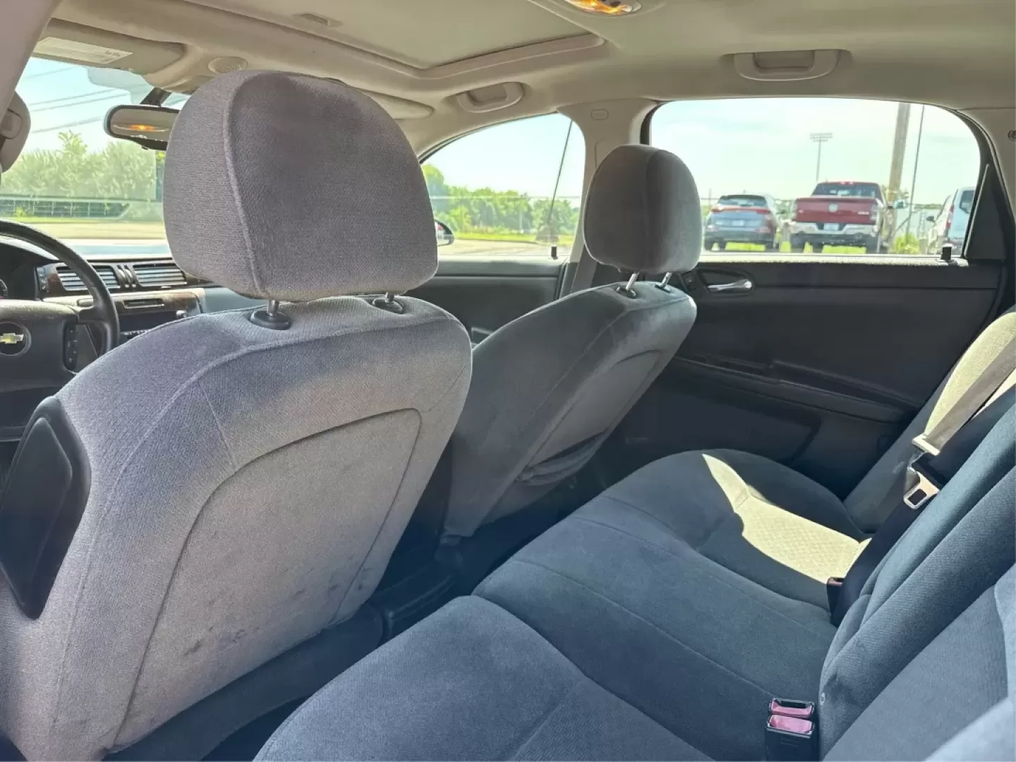 2014 Chevrolet Impala Limited LT (2G1WB5E3XE1) with an 3.6L V-6 gasoline direct injection engine, located at 8750 N County Rd 25A, Piqua, OH, 45356, (937) 908-9800, 40.164391, -84.232513 - Are you ready for your next adventure, whether it's a family road trip, a daily commute, or simply running errands around Fairborn? The 2014 Chevrolet Impala Limited LT is the perfect sedan to elevate your driving experience. With its stylish black exterior and reliable performance, this vehicle is - Photo#10