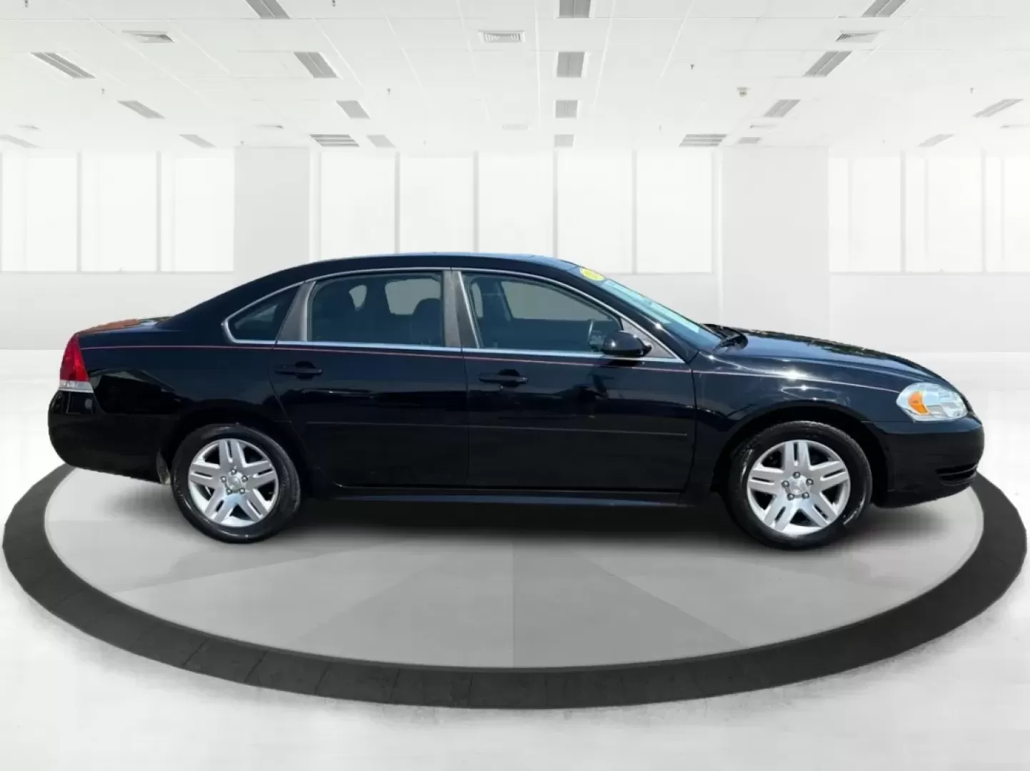 2014 Chevrolet Impala Limited LT (2G1WB5E3XE1) with an 3.6L V-6 gasoline direct injection engine, located at 1951 S Dayton Lakeview Rd., New Carlisle, OH, 45344, (937) 908-9800, 39.890999, -84.050255 - Are you ready for your next adventure, whether it's a family road trip, a daily commute, or simply running errands around Fairborn? The 2014 Chevrolet Impala Limited LT is the perfect sedan to elevate your driving experience. With its stylish black exterior and reliable performance, this vehicle is - Photo#1