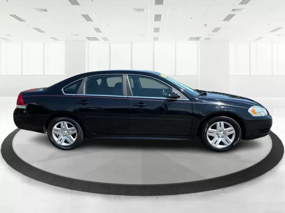 2014 Chevrolet Impala Limited LT (2G1WB5E3XE1) with an 3.6L V-6 gasoline direct injection engine, located at 1230 East Main St, Xenia, OH, 45385, (937) 908-9800, 39.688026, -83.910172 - Are you ready for your next adventure, whether it's a family road trip, a daily commute, or simply running errands around Fairborn? The 2014 Chevrolet Impala Limited LT is the perfect sedan to elevate your driving experience. With its stylish black exterior and reliable performance, this vehicle is - Photo#1